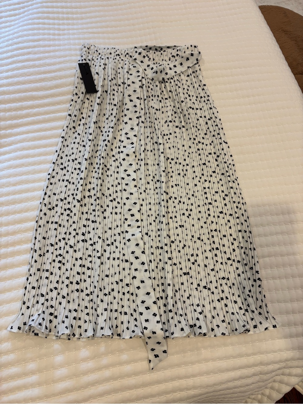Pleated White Midi Skirt with Black Dot Print